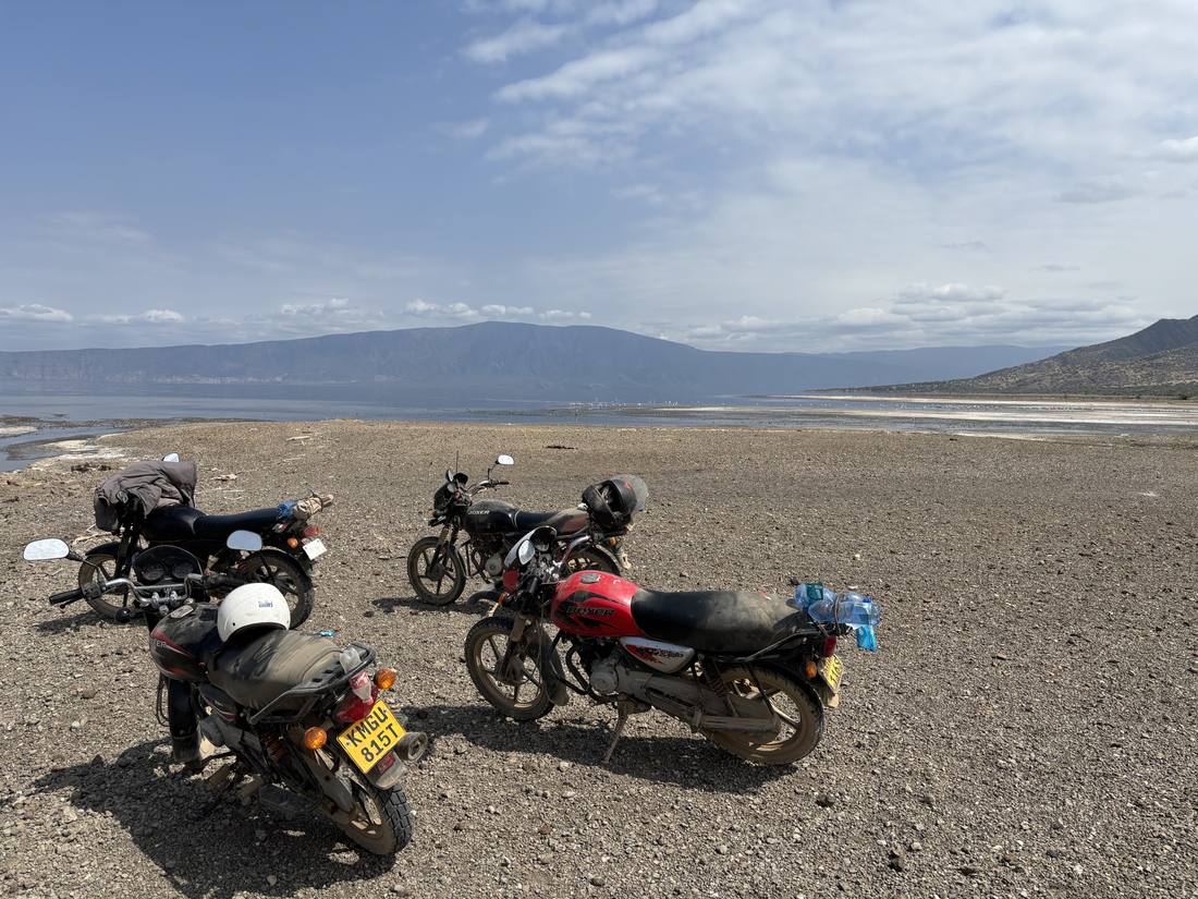 Motorbikes parked on the shore of a salt lake